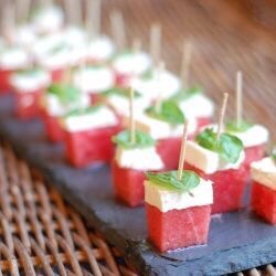 Watermelon with feta cheese and mint leaves